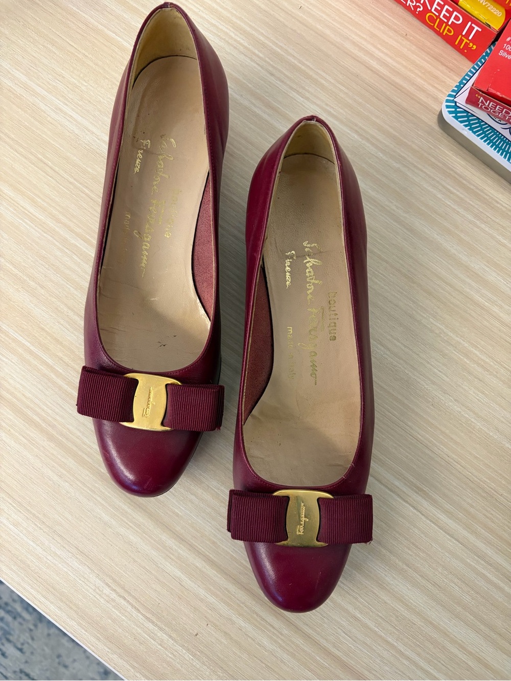 Salvatore Ferragamo Burgundy Leather Bow Pumps with Gold Accent